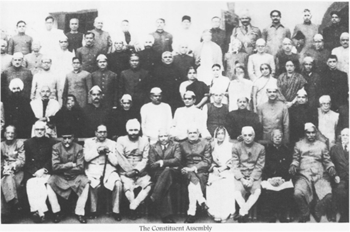 A large group of people posing for a photo

Description automatically generated